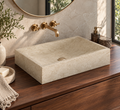Lavabo DANA de mármol beige natural sobre encimera